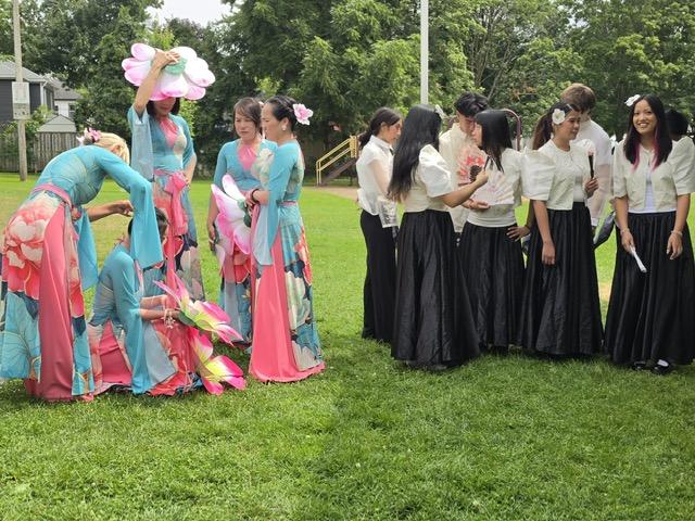 Cultural performers gathering on the lawn